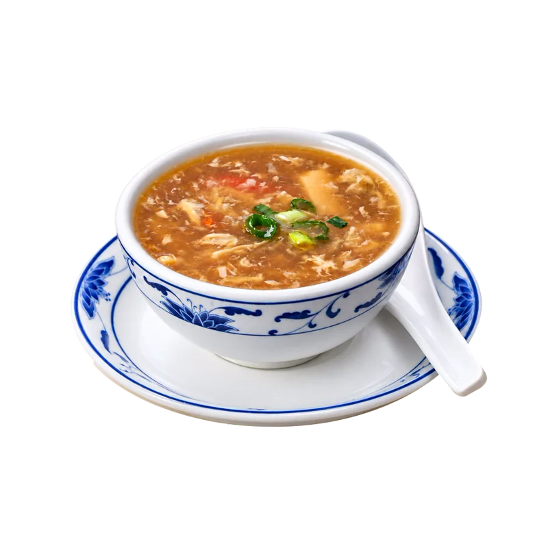 Hot and sour soup in a blue and white bowl
