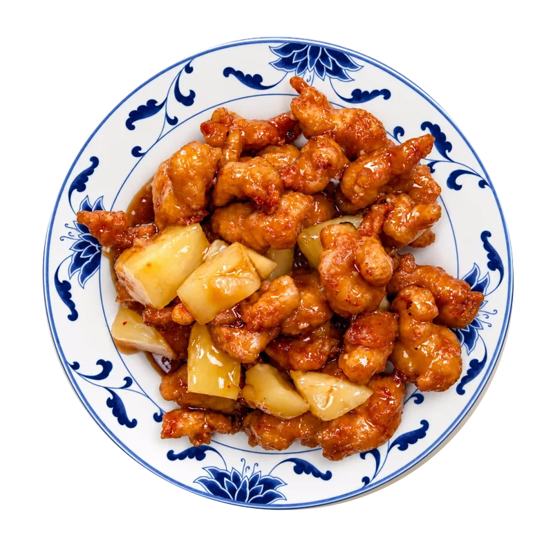 Orange chicken in sweet orange sauce on a blue and white plate