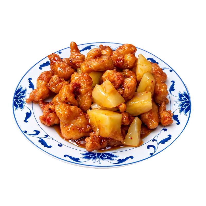 Pineapple chicken with chunks of pineapple on a blue and white plate
